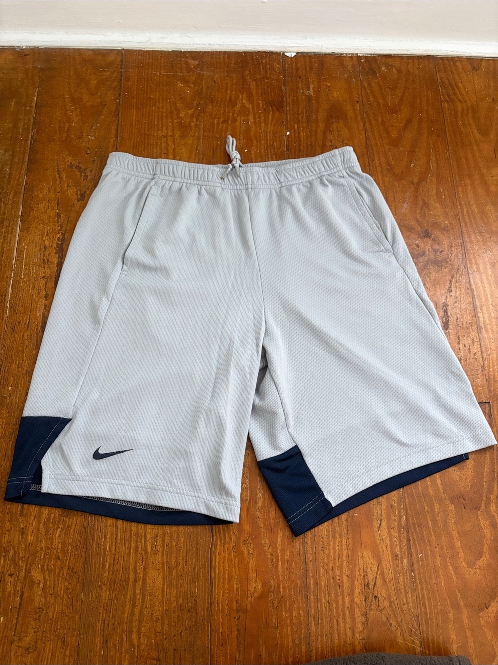 Nike Men’s Light Gray Athletic Shorts with Navy Accents